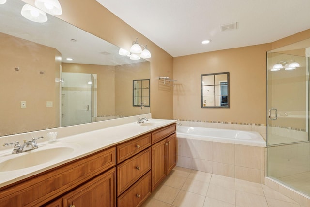 8301 Creekside Cir Unit 570, Bloomington, MN 55437 - full bath featuring tile patterned flooring, a bath, double vanity, a shower stall, and recessed lighting