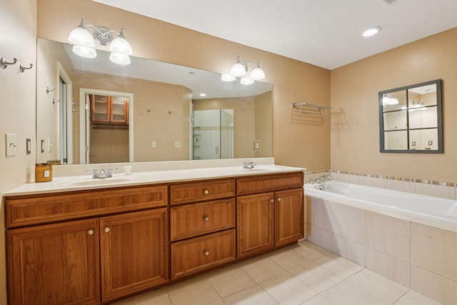 8301 Creekside Cir Unit 570, Bloomington, MN 55437 - bathroom with tile patterned flooring, double vanity, a garden tub, and a shower with shower door