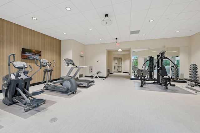 8301 Creekside Cir Unit 570, Bloomington, MN 55437 - workout area with carpet floors, recessed lighting, and an accent wall