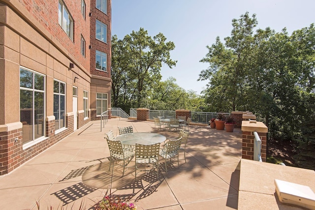 8301 Creekside Cir Unit 570, Bloomington, MN 55437 - view of patio featuring outdoor dining space