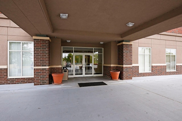 8301 Creekside Cir Unit 570, Bloomington, MN 55437 - entrance to property featuring french doors and brick siding