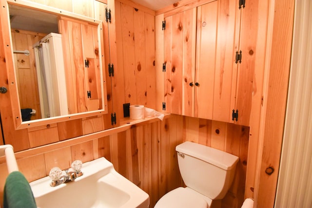 21840 320th Ave NW, Warren, MN 56762 - bathroom with toilet and wood walls