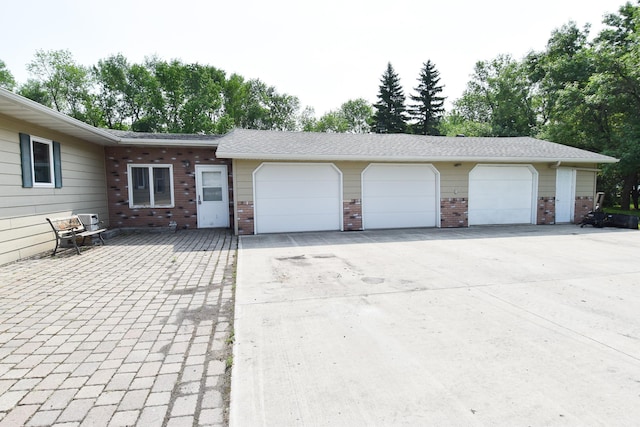 21840 320th Ave NW, Warren, MN 56762 - garage featuring driveway