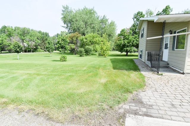 21840 320th Ave NW, Warren, MN 56762 - view of grassy yard with view of wooded area