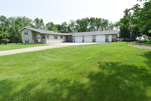 21840 320th Ave NW, Warren, MN 56762 - view of front facade featuring driveway, a front lawn, and a garage