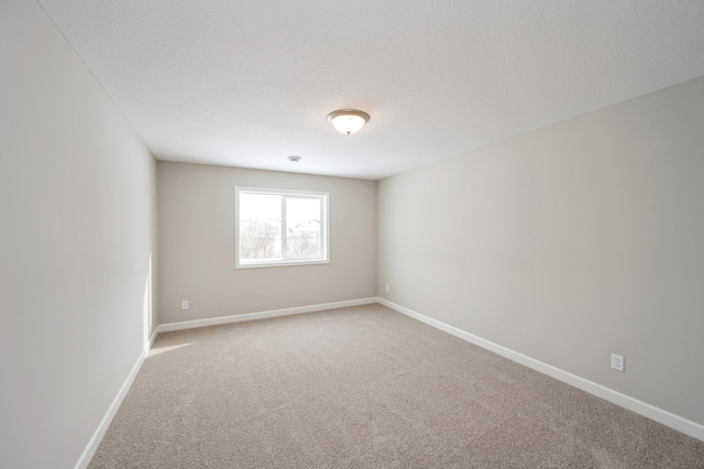 1486 Otter Way, New Richmond, WI 54017 - unfurnished room with light colored carpet and baseboards