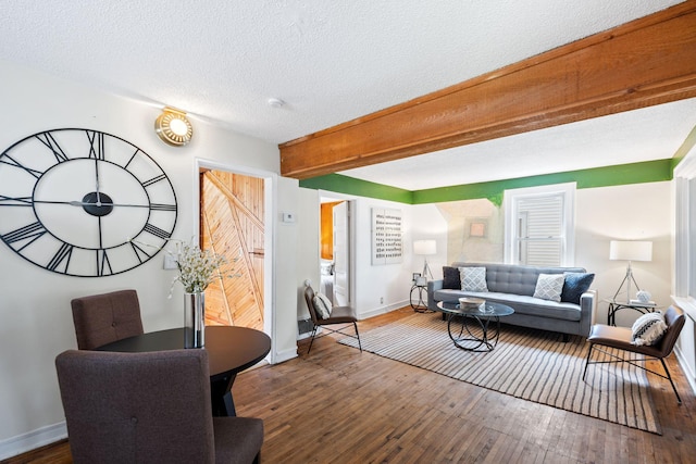 5545 45th Ave S, Minneapolis, MN 55417 - living room featuring a textured ceiling, wood finished floors, and beamed ceiling