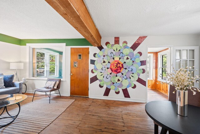 5545 45th Ave S, Minneapolis, MN 55417 - entrance foyer with a textured ceiling, wood finished floors, and beam ceiling