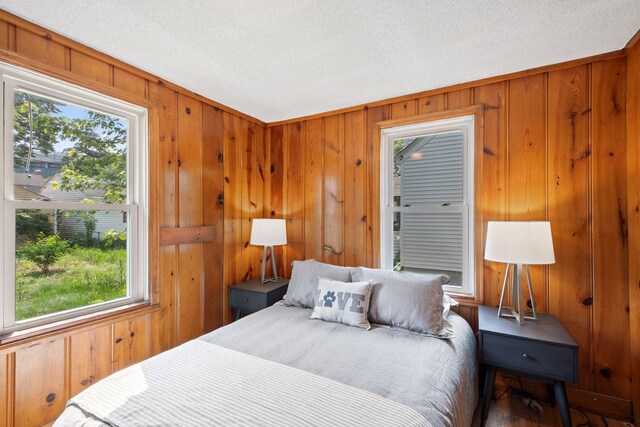 5545 45th Ave S, Minneapolis, MN 55417 - bedroom with multiple windows and wood walls