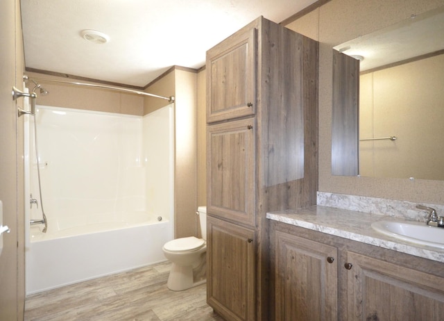 311 Mozart Ave E, Mankato, MN 56001 - bathroom with vanity, bathing tub / shower combination, and wood finished floors