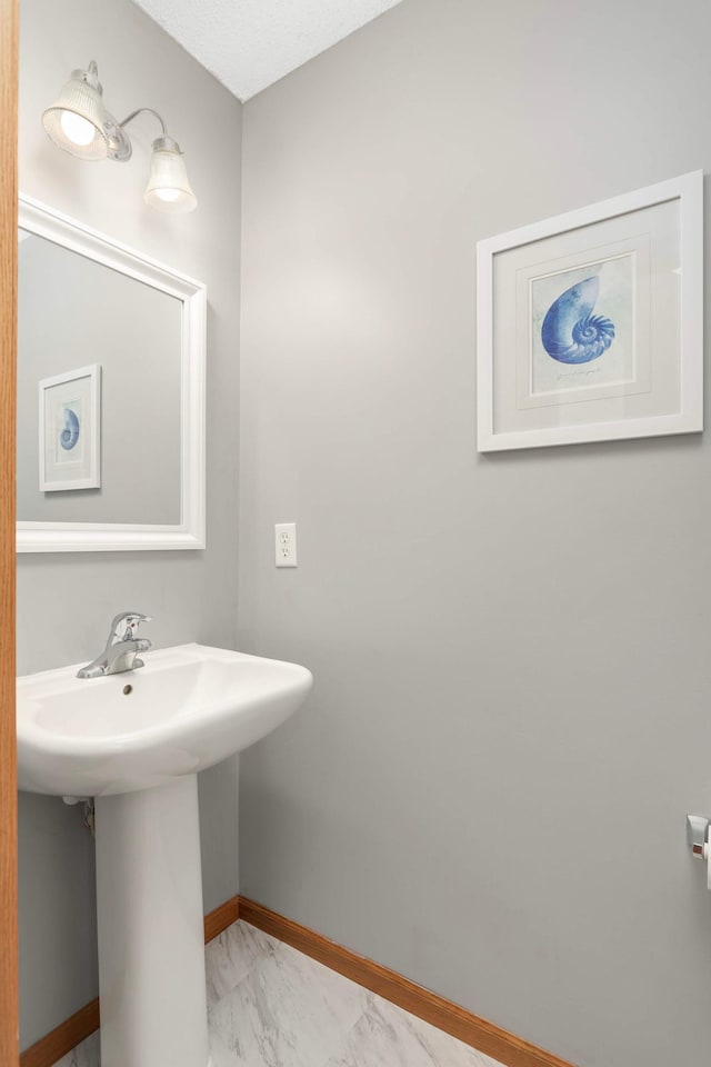 5055 149th St N Unit 2, Hugo, MN 55038 - bathroom with marble finish floors and baseboards