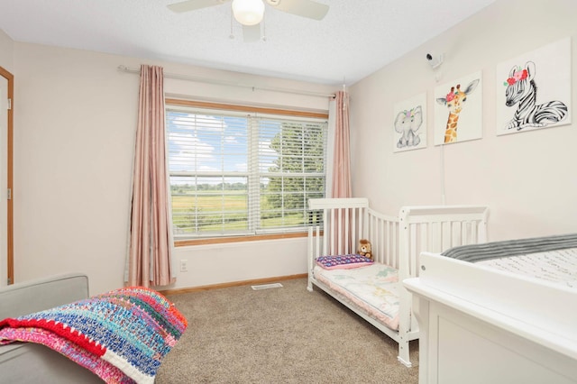 5055 149th St N Unit 2, Hugo, MN 55038 - carpeted bedroom with multiple windows and a ceiling fan