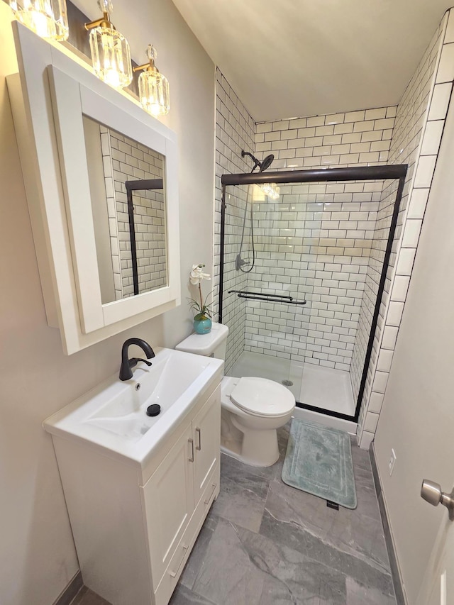 1323 Lincoln Ave, Saint Paul, MN 55105 - full bath with a stall shower, vanity, toilet, and marble finish floors