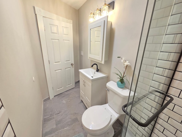 1323 Lincoln Ave, Saint Paul, MN 55105 - bathroom with marble tiled floors, vanity, and toilet
