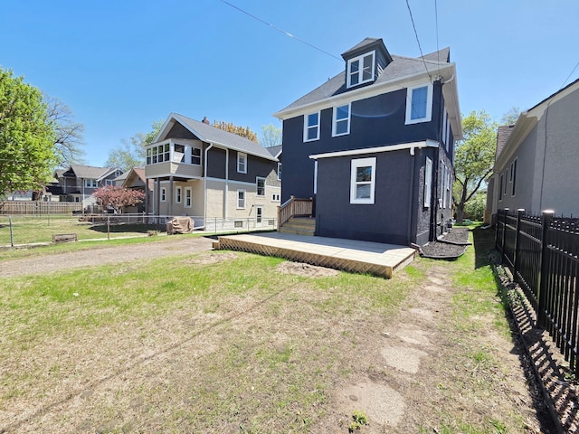 1323 Lincoln Ave, Saint Paul, MN 55105 - back of house featuring stucco siding