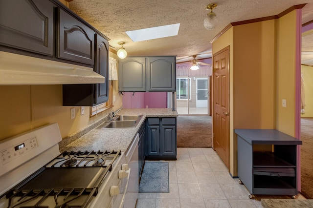 33087 Elm Ln, Motley, MN 56466 - kitchen with white gas stove, a skylight, light colored carpet, under cabinet range hood, and light countertops