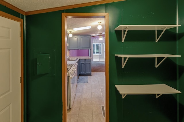 33087 Elm Ln, Motley, MN 56466 - corridor featuring a textured ceiling, crown molding, and light tile patterned floors