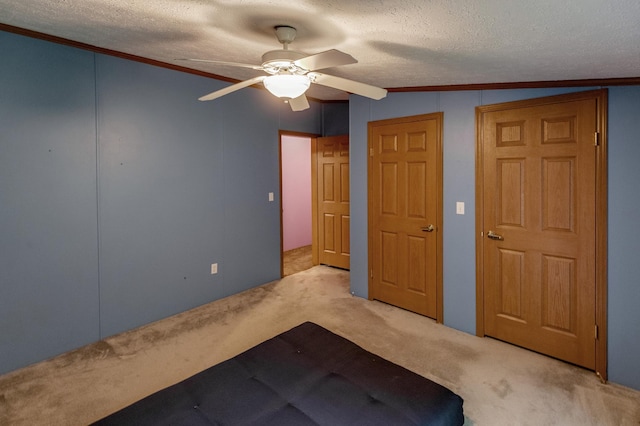 33087 Elm Ln, Motley, MN 56466 - unfurnished bedroom featuring carpet, ornamental molding, a textured ceiling, and a ceiling fan