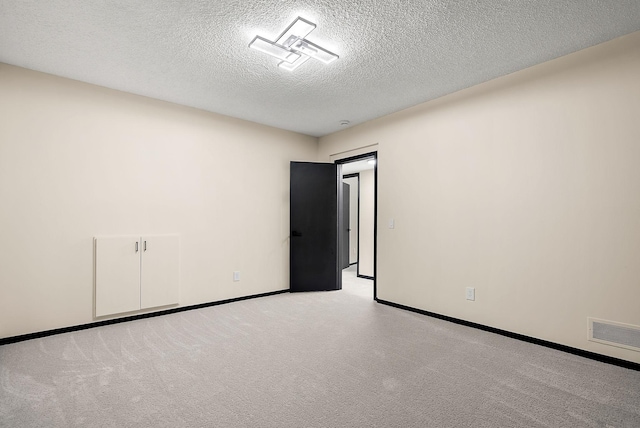8335 Virginia Ave S, Bloomington, MN 55438 - unfurnished room with a textured ceiling and carpet
