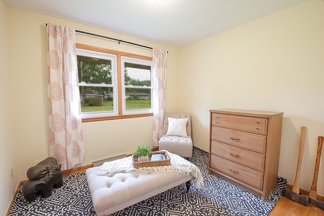 905 24th Ave N, Saint Cloud, MN 56303 - living area with wood finished floors and baseboard heating