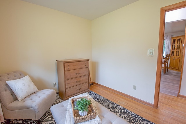 905 24th Ave N, Saint Cloud, MN 56303 - living area featuring light wood-type flooring and baseboards