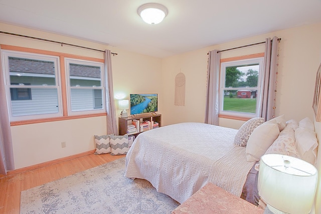 905 24th Ave N, Saint Cloud, MN 56303 - bedroom featuring wood finished floors and baseboards