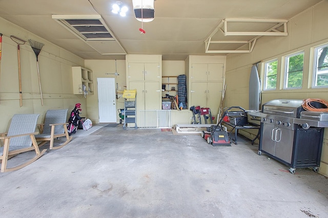 905 24th Ave N, Saint Cloud, MN 56303 - garage with a garage door opener