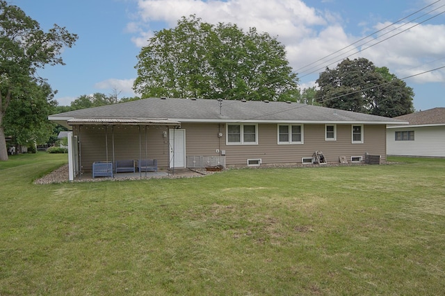 905 24th Ave N, Saint Cloud, MN 56303 - back of house featuring a lawn and a patio