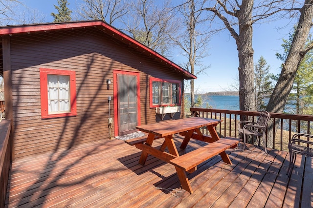 7520 Trophy Trl NW, Walker, MN 56484 - deck featuring a water view and outdoor dining space