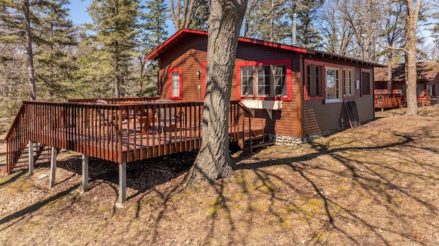 7520 Trophy Trl NW, Walker, MN 56484 - view of side of home with a deck