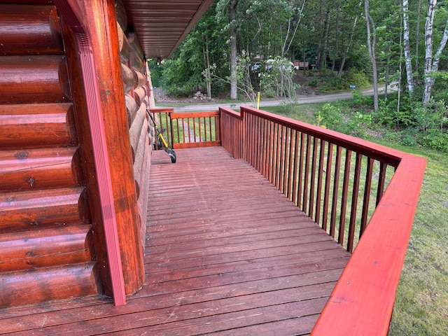 7520 Trophy Trl NW, Walker, MN 56484 - wooden terrace featuring a view of trees