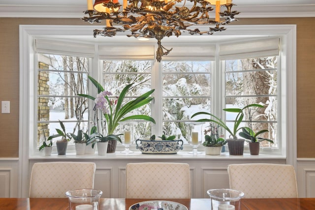 11155 Mill Run, Minnetonka, MN 55305 - dining room featuring a chandelier, healthy amount of natural light, and crown molding