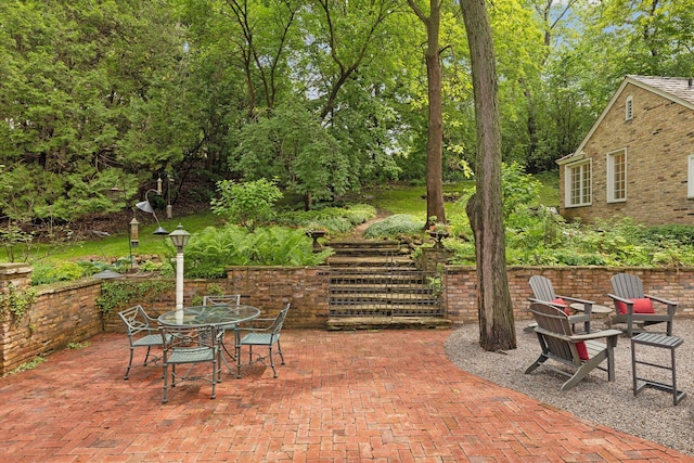11155 Mill Run, Minnetonka, MN 55305 - view of patio with view of wooded area and outdoor dining area