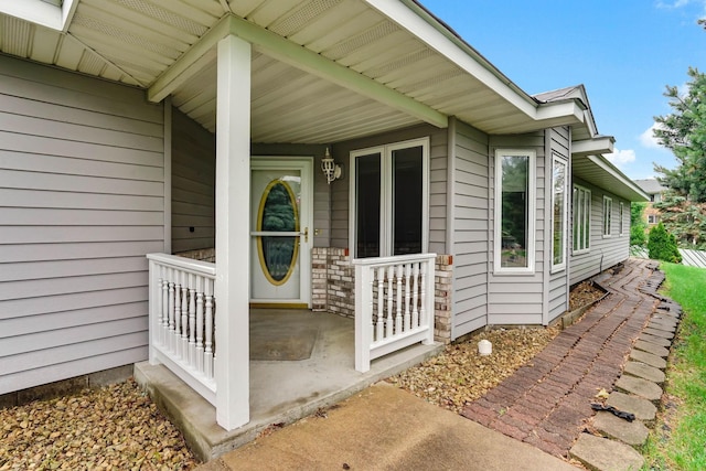5645 Wisconsin Ave N, New Hope, MN 55428 - view of exterior entry featuring a porch