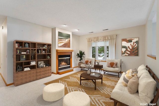 5645 Wisconsin Ave N, New Hope, MN 55428 - carpeted living room featuring a glass covered fireplace and baseboards