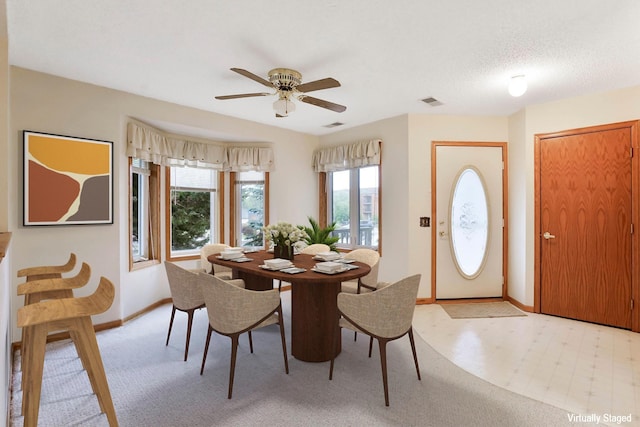 5645 Wisconsin Ave N, New Hope, MN 55428 - dining room with a ceiling fan and baseboards