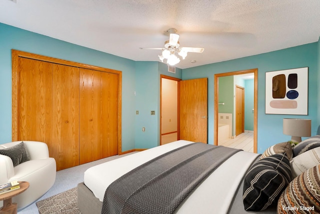 5645 Wisconsin Ave N, New Hope, MN 55428 - bedroom with a closet, a ceiling fan, carpet, and connected bathroom
