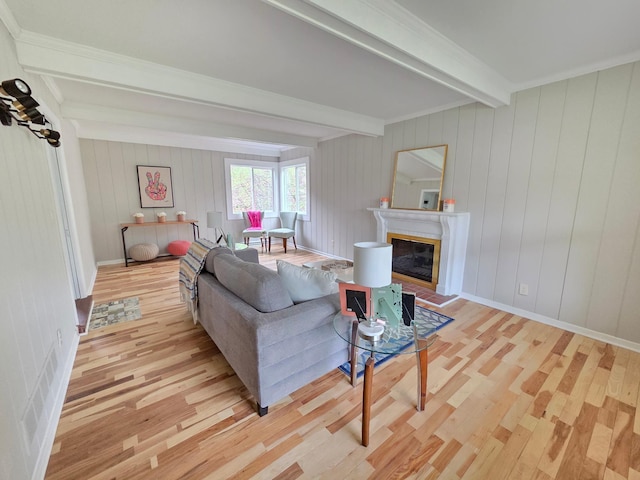 13801 Lake Street Ext, Minnetonka, MN 55345 - living area with beam ceiling, light wood-type flooring, and a glass covered fireplace