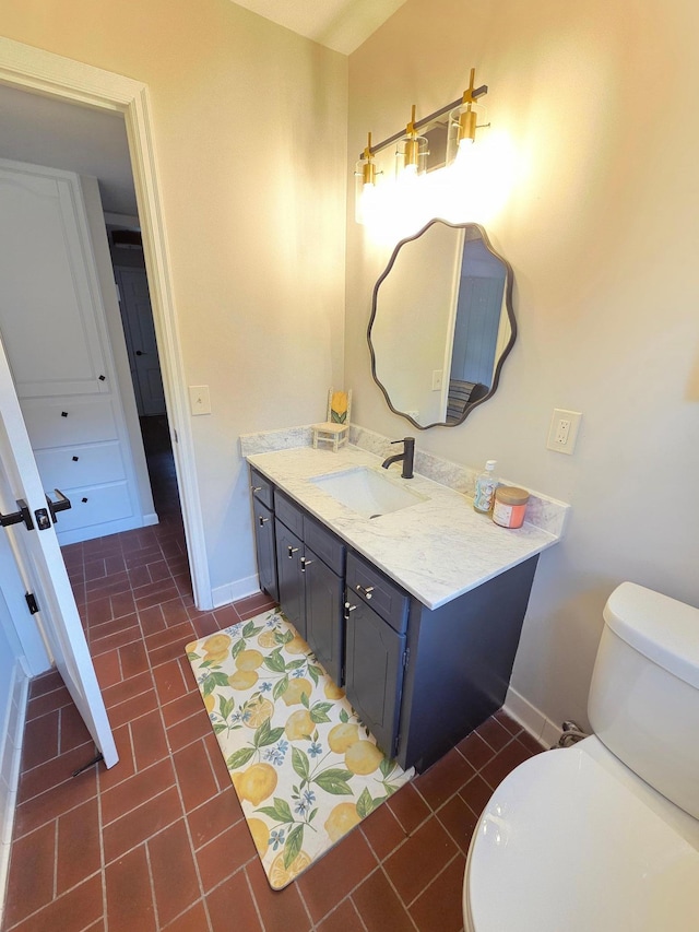 13801 Lake Street Ext, Minnetonka, MN 55345 - half bathroom featuring vanity, baseboards, toilet, and tile patterned flooring