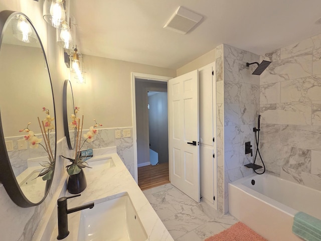 13801 Lake Street Ext, Minnetonka, MN 55345 - bathroom with marble look tiles, shower / washtub combination, and double vanity