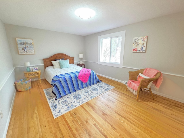 13801 Lake Street Ext, Minnetonka, MN 55345 - bedroom with wood finished floors and baseboards