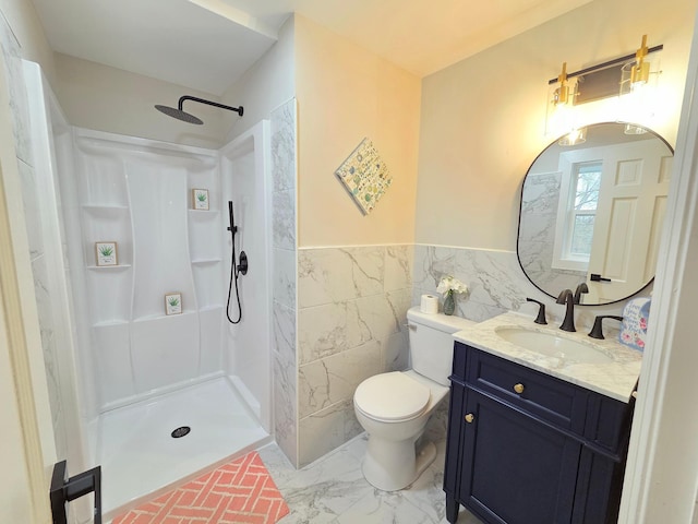 13801 Lake Street Ext, Minnetonka, MN 55345 - bathroom featuring tile walls, a walk in shower, vanity, toilet, and wainscoting