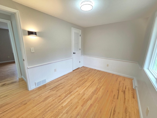 13801 Lake Street Ext, Minnetonka, MN 55345 - spare room with light wood-style flooring and baseboards