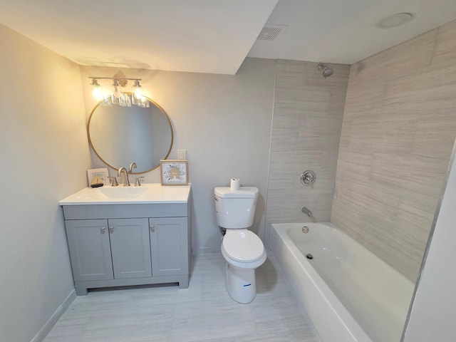 13801 Lake Street Ext, Minnetonka, MN 55345 - bathroom featuring toilet, baseboards, vanity, and tub / shower combination