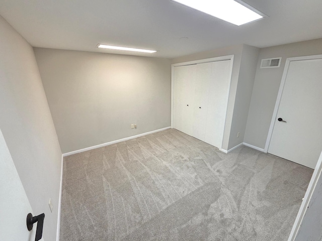 13801 Lake Street Ext, Minnetonka, MN 55345 - unfurnished bedroom featuring carpet, baseboards, and a closet