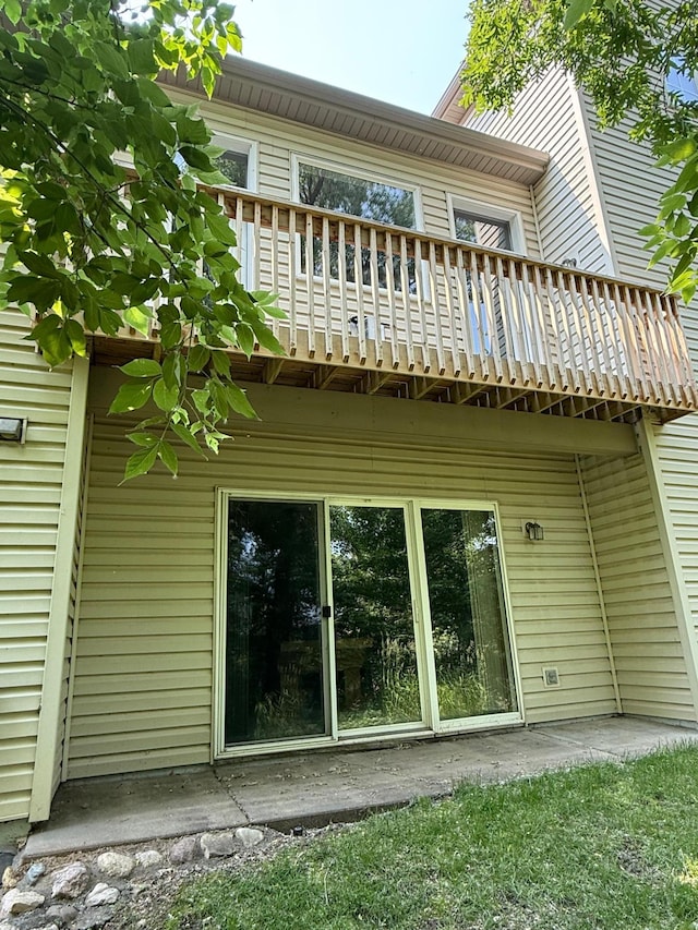 1426 Mcandrews Rd E Unit 30, Burnsville, MN 55337 - back of house featuring a balcony