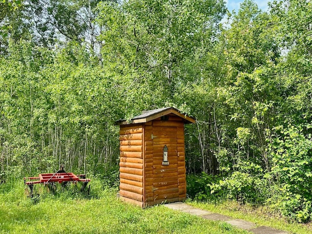 3274 County Road 1 SW, Boone Twp, MN 56623 - view of shed with a forest view