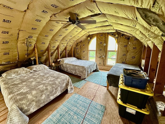 3274 County Road 1 SW, Boone Twp, MN 56623 - bedroom featuring lofted ceiling, wood finished floors, and ceiling fan