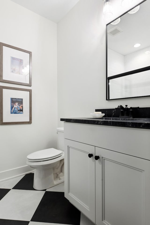 5240 Polaris Ln N, Plymouth, MN 55446 - bathroom with vanity, toilet, baseboards, tile patterned floors, and a shower