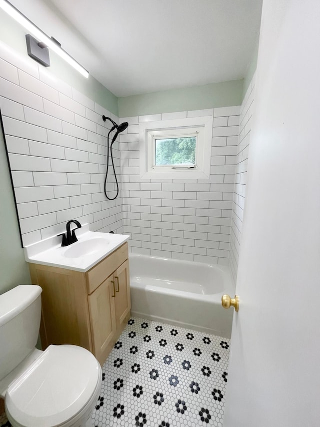 4241 Tyler St NE, Columbia Heights, MN 55421 - full bath with tile patterned flooring, vanity, and bathing tub / shower combination